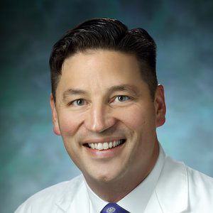 Headshot of Greg Osgood.